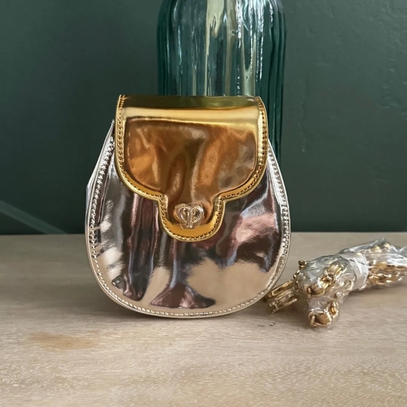 cle de peau Handbags - Cle De Peau Silver And Gold Metallic Mini Crossbody Bag With Chain Strap NEW
